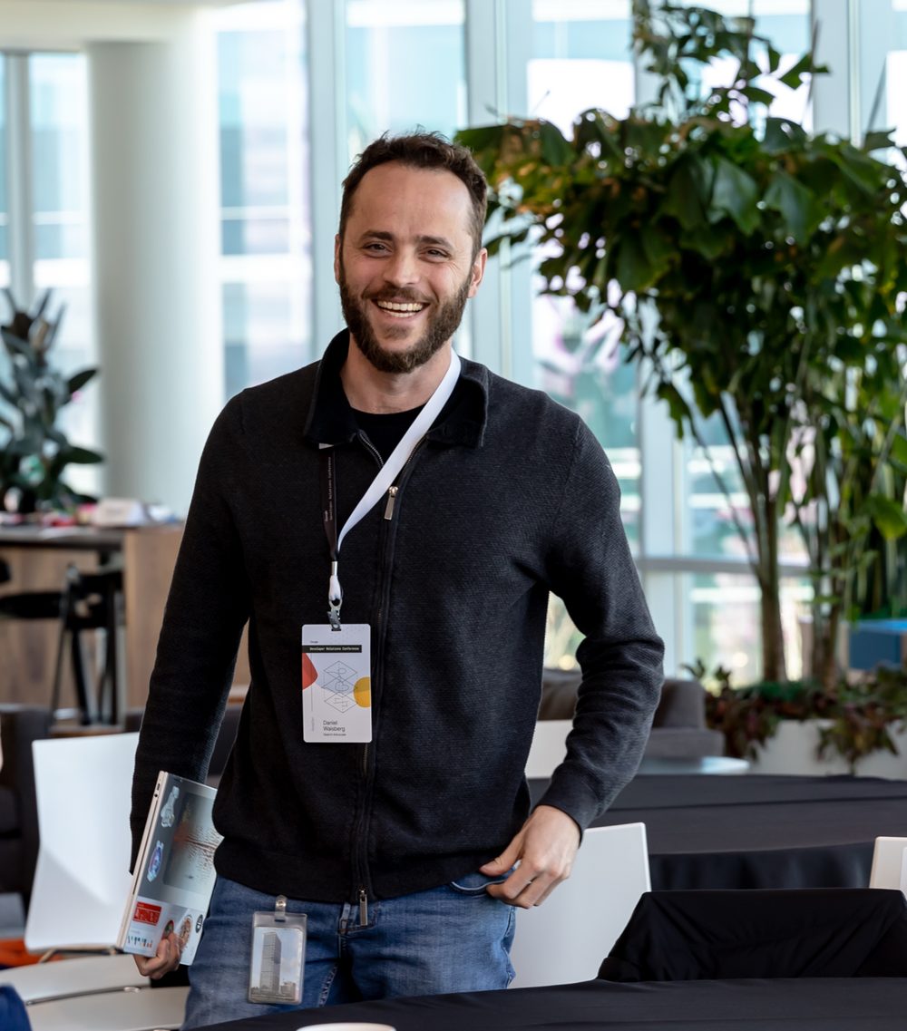 Daniel Waisberg smiling at a Google developer relations conference